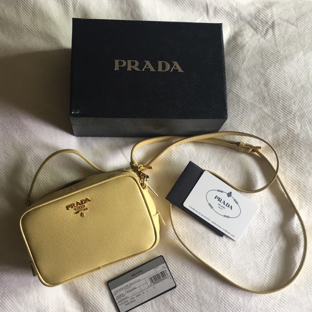 Yellow Prada camera bag in saffiano